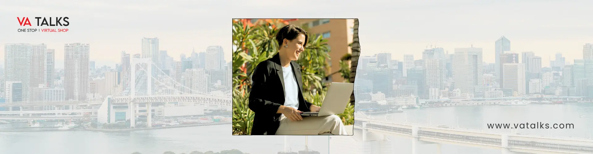 Remote virtual assistant working on laptop with San Francisco skyline – VA Talks